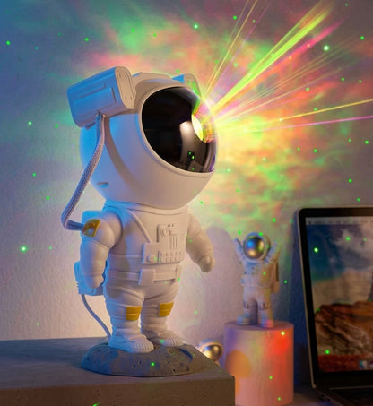 Astronauta proyector de galaxias